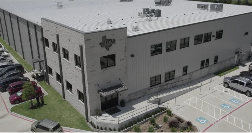 Exterior view of Texas Injection Molding facility in Houston specializing in medical and plastic injection molding