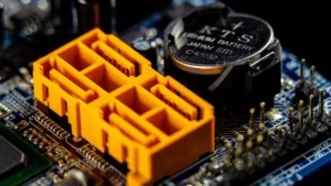 Orange flame-rated plastic electrical connector on a circuit board for UL 94 injection molding applications.